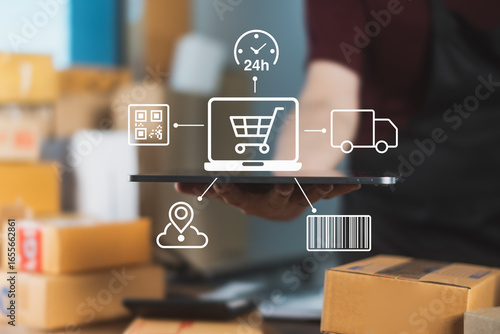 E-commerce seller holding tablet with icons representing 24/7 online shopping, barcode tracking, delivery, and smart logistics system