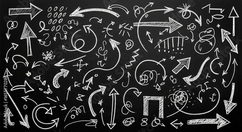 Hand-drawn arrows doodled on a chalkboard
