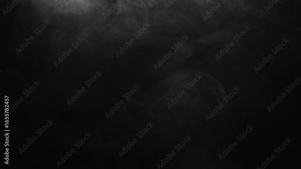 Delicate mist slowly drifting across black background. Ethereal fog or smog effect for atmospheric overlays and moody visuals.