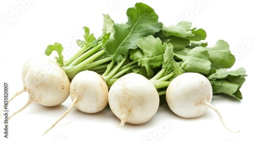 Fresh white turnips with green leaves on white background