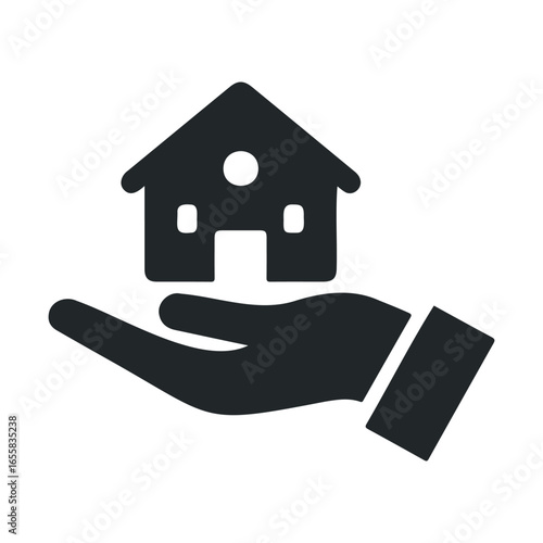 Black silhouette of open hand holding a house symbol on white background