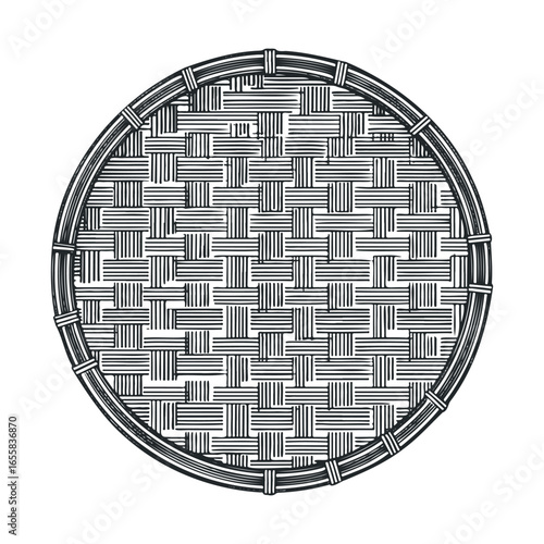 Circular woven bamboo basket with intricate black and white pattern