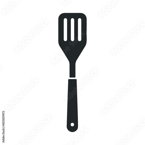Silhouette of kitchen spatula with slotted blade on white background