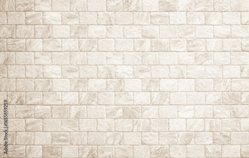 Detail of modern cream brick wall background photo. White light brick wall texture background for stone tile block painted in beige light color wallpaper modern interior and exterior backdrop design.