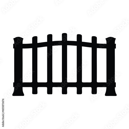 Silhouette of a classic wooden picket fence section on a  