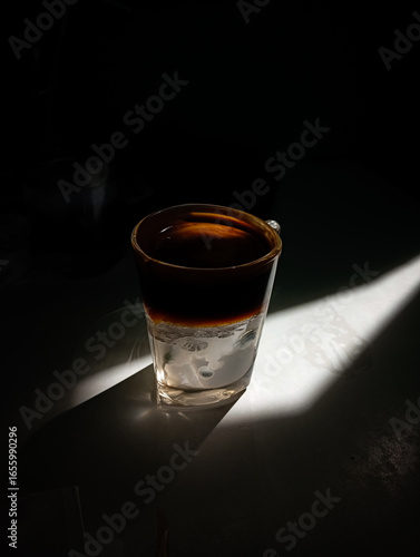 glass of water on black