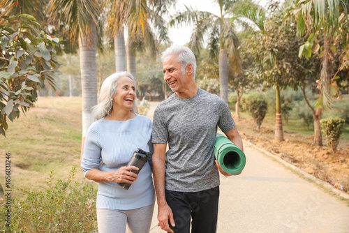 Romantic Happy Couple Enjoying A Walk In A Park 