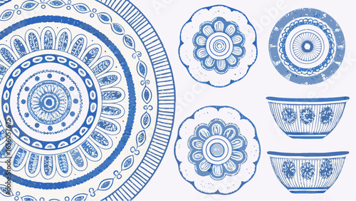 Blue and white floral patterned tableware including plates and bowls in a decorative arrangement style silhouette