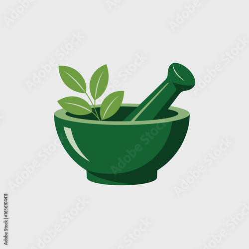 Green mortar and pestle with fresh leaves for herbal medicine
