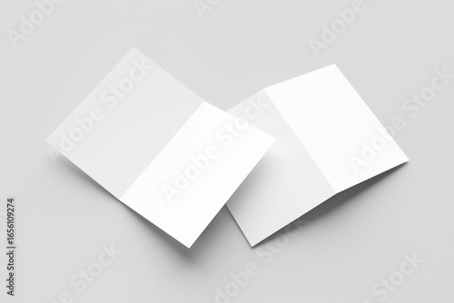 Bifold mockup. A pair of white bifold cards, one open and one closed, casting shadows isolated on a light grey background