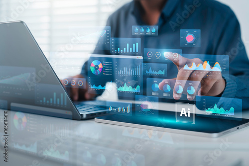 An analyst uses computer and dashboard for data business analysis and Data Management System with KPI and metrics connected to the database for technology finance, operations, sales, SEO marketing
