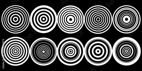 A collection of twelve circular graphic elements, set against a black background. Each element is composed of radiating, concentric, thin, white lines forming various circular and spiral patterns. Som