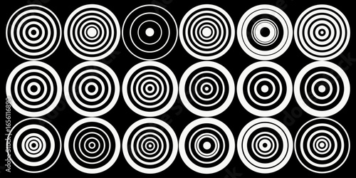 A collection of twelve circular graphic elements, set against a black background. Each element is composed of radiating, concentric, thin, white lines forming various circular and spiral patterns. Som