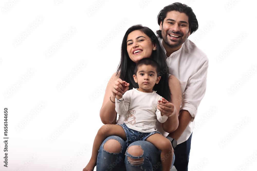 Family Enjoys A Joyful Moment Together Indoors Family Enjoys A Joyful Moment Together Indoors