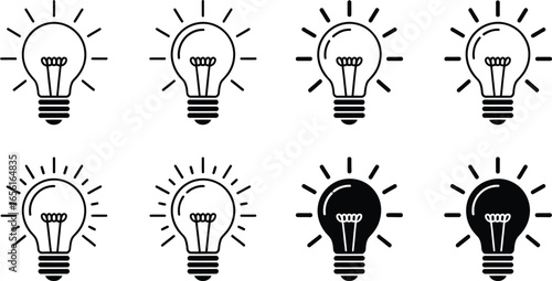 Light Bulb Icon Set with Radiating Lines on Transparent Background in Style