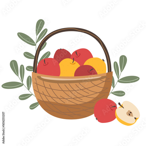 Wicker basket full of red and yellow apples with green leaves. Harvest season concept for healthy eating and natural food.