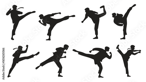 Silhouettes of men kicking