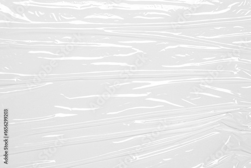 plastic overlay texture of realistic crumpled transparent plastic film wrap on white background,wrinkled stretched plastic effect.abstract plastic background on transparent png