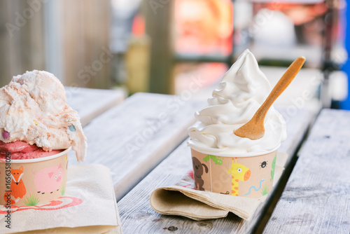 Summer café scene with soft serve and strawberry ice cream in cute animal design cups