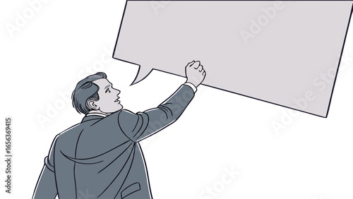 Businessman Holding Up Blank Speech Bubble.