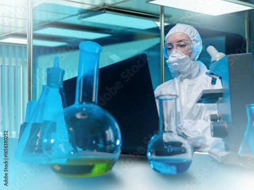 Scientist in protective sui...