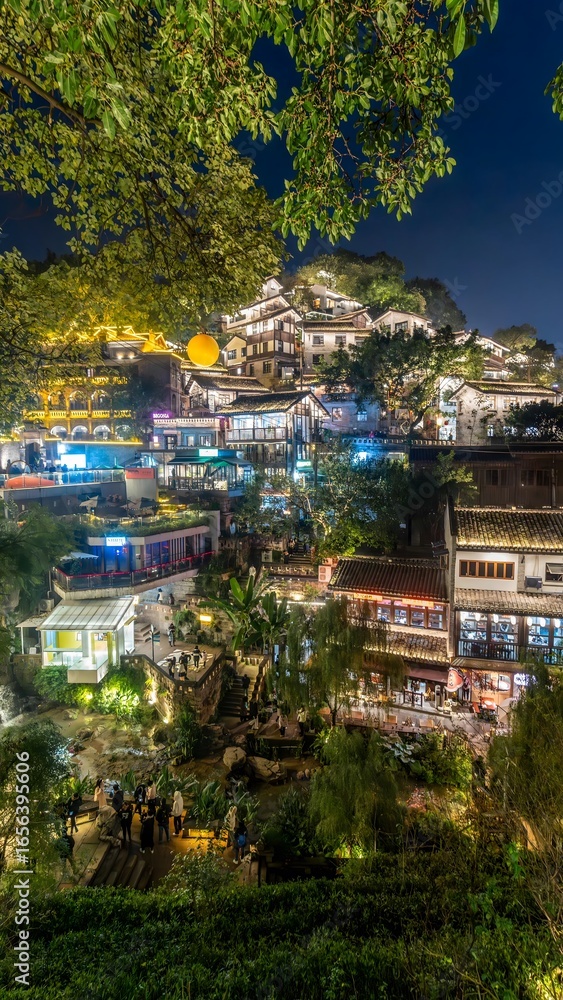 Fototapeta premium Captivating Night Cityscape of Mountain Hillside Buildings in Chongqing, China - Aerial Urban Vista