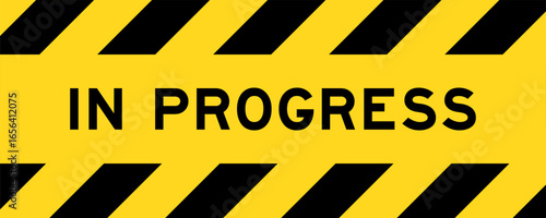 Yellow and black color with line striped label banner with word in progress