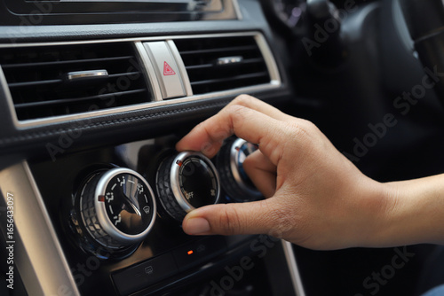 car air conditioner is not cool due to a refrigerant leak.