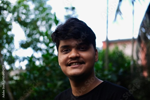 Smiling portrait of a handsome young man