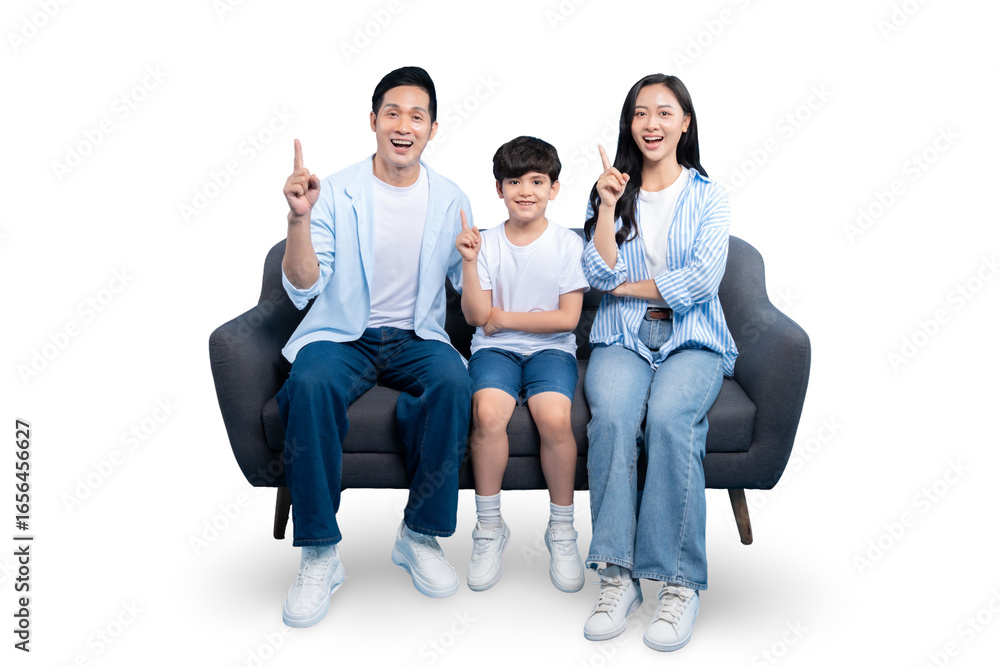 A happy family of three sitting together on a couch and pointing their fingers up in PNG A happy family of three sitting together on a couch and pointing their fingers up in PNG