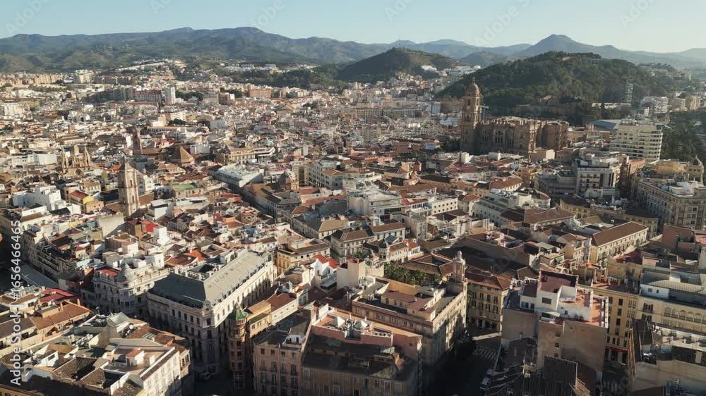 Picturesque panorama of old town Malaga captured by a drone. Aerial video, flying forwards. Picturesque panorama of old town Malaga captured by a drone. Aerial video, flying forwards.