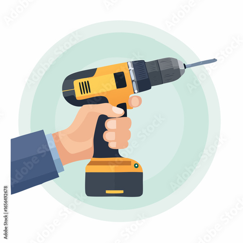 Hand Holding A Yellow Electric Drill