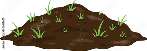 A small mound of rich brown soil with sparse green grass sprouts emerging from the surface isolated on a white background