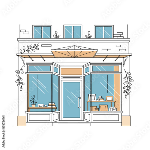 Charming european style boutique shopfront with large display windows and decorative awning
