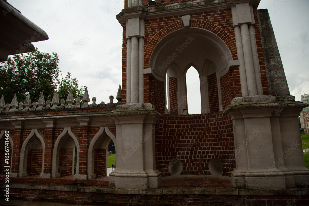 Obraz premium Historical old bridge of red brick of the fortress