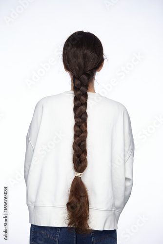 Portrait of a girl with a long braid