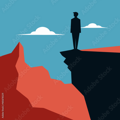 Silhouette of person on cliff edge overlooking mountains