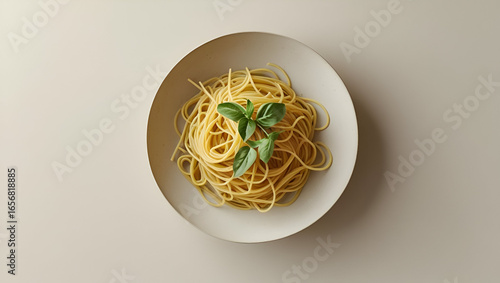 Minimal Spaghetti Aglio e Olio Nest on White Plate: A small, elegant nest of spaghetti aglio e olio lightly twirled on a white plate, with a glistening olive oil glaze and delicate garlic slivers.  