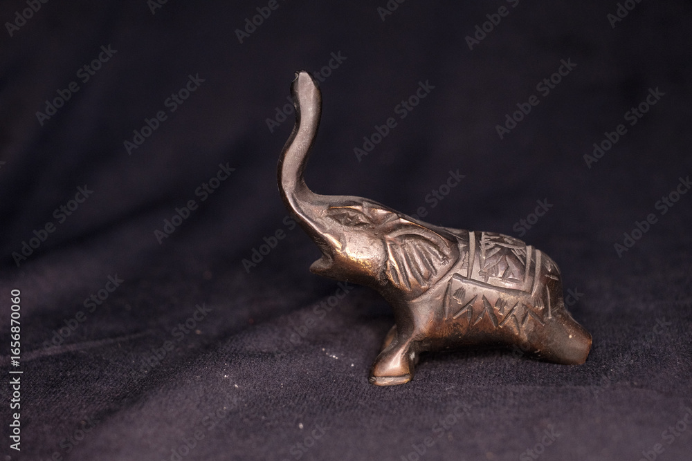 Obraz premium Handcrafted Brass Elephant Figurine with Trunk Up ,Vintage Decorative Sculpture