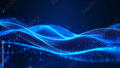 A mesmerizing display of luminous, flowing blue particles, creating intricate, wave-like patterns against a dark backdrop.