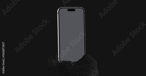 Fotografia A sleek, modern smartphone is displayed on a dark surface, showcasing its minimalist design and technological appeal