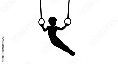 Silhouette of a gymnast performing on still rings with arms extended and legs angled downwards elegantly
