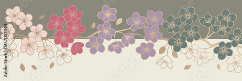 A floral arrangement featuring pink red purple and green flowers on branches against a two tone background