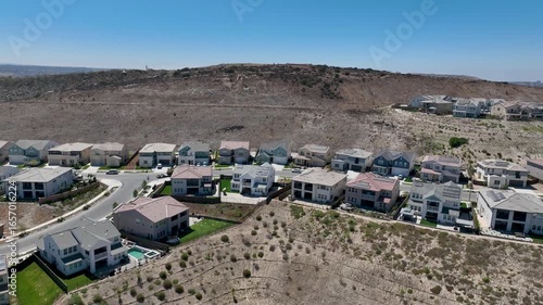 New development real estate. Aerial view of residential houses and driveways neighborhood in south San Diego, Chula Vista. Packed homes. Top view over private houses