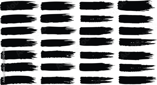 Collection of 30 black brush strokes isolated on white background, representing art and design elements with a textured, grunge feel