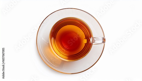 top view of a cup of amber tea on a saucer isolated on white background