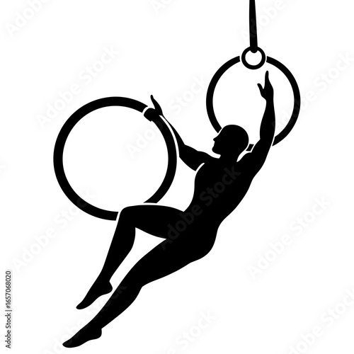 Athletic man performing on gymnastic rings strength