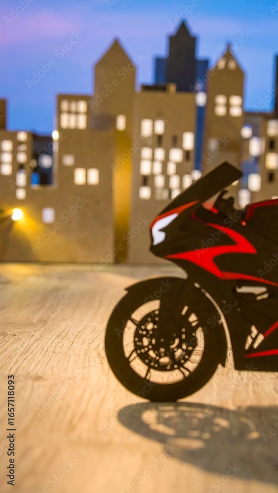 Fototapeta premium Silhouette motorcycle in city scene