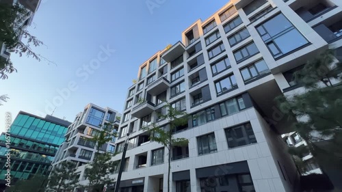 Wallpaper Mural Ultra-Wide Bottom-Up View: Luxury Mid-Rise Complex Tour | Modern Mixed-Use Apartments with Green Landscaping | Urban Architectural Development from Ground Level Torontodigital.ca