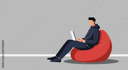 A young man comfortably uses his laptop on a red bean bag chair, embodying relaxed remote work or digital learning. Ideal for lifestyle, business, or technology themes.